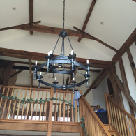 large black chandelier installed in family home