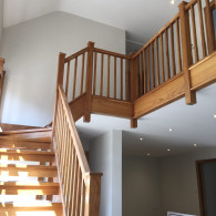 Wooden staircase with flush lighting on ceiling in a home in Lakenheath