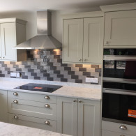 light green kitchen with marble worktop with new electrics fitted in Lakenheath