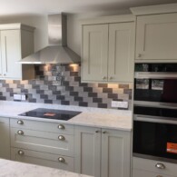 light green kitchen with marble worktop with new electrics fitted in Lakenheath